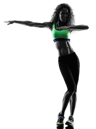 one african woman woman zumba dancer dancing exercises  in studio silhouette isolated on white background Stock Photo - Budget Royalty-Free & Subscription, Code: 400-08111282
