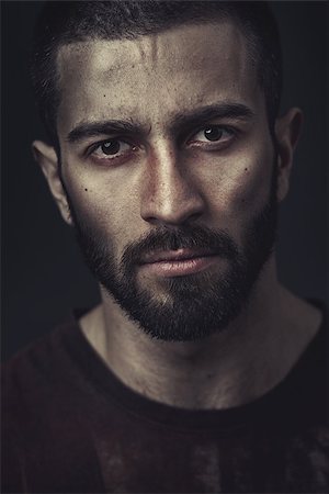 Portrait of a bearded man on dark background Stock Photo - Budget Royalty-Free & Subscription, Code: 400-08111449