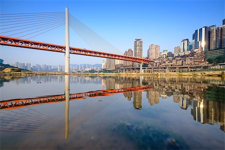 Chongqing, China cityscape at the Jialing River and Qianximen Bridge. Foto de stock - Super Valor sin royalties y Suscripción, Código: 400-08111828