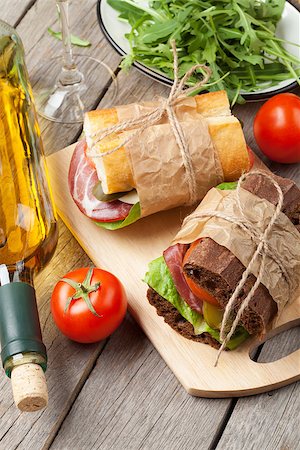 simsearch:400-07937807,k - Two sandwiches and white wine on wooden table Photographie de stock - Aubaine LD & Abonnement, Code: 400-08111955