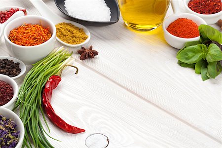 red pepper and garlic - Various spices on white wooden background with copy space Stock Photo - Budget Royalty-Free & Subscription, Code: 400-08112008