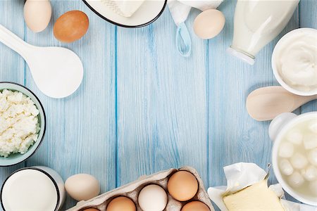 simsearch:400-08296754,k - Dairy products on wooden table. Sour cream, milk, cheese, egg, yogurt and butter. Top view with copy space Stock Photo - Budget Royalty-Free & Subscription, Code: 400-08112034