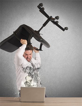 simsearch:400-09030070,k - Stressed businessman breaks the computer with chair Stock Photo - Budget Royalty-Free & Subscription, Code: 400-08112134