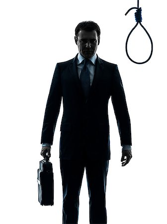 one  businessman standing in front of hangman's noose in silhouette studio isolated on white background Stock Photo - Budget Royalty-Free & Subscription, Code: 400-08112629