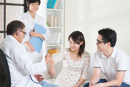 Asian couple consult doctor. Woman health concept. Stock Photo - Budget Royalty-Free & Subscription, Code: 400-08112858