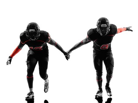 simsearch:400-08335037,k - two american football players running in silhouette shadow on white background Foto de stock - Royalty-Free Super Valor e Assinatura, Número: 400-08113070