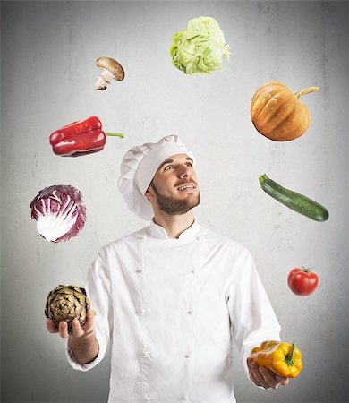Chef plays with the vegetable as a juggler Stock Photo - Budget Royalty-Free & Subscription, Code: 400-08113128