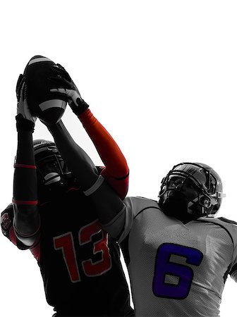 simsearch:400-07973138,k - two american football players pass action in silhouette shadow on white background Stock Photo - Budget Royalty-Free & Subscription, Code: 400-08113285