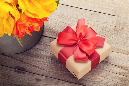 simsearch:400-08036453,k - Colorful tulips bouquet and gift box over wooden table background. Toned Stock Photo - Budget Royalty-Free & Subscription, Code: 400-08113724