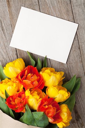 simsearch:400-08036453,k - Colorful tulips bouquet and blank greeting card over wooden table background with copy space Stock Photo - Budget Royalty-Free & Subscription, Code: 400-08113723
