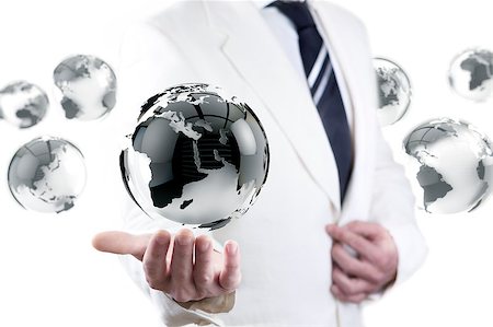 businessman and globe world map. International global company concept. Stock Photo - Budget Royalty-Free & Subscription, Code: 400-08113911