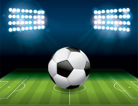 A soccer ball football sitting on a stadium field at night. Vector EPS 10 available. EPS file contains transparencies and gradient mesh. Fotografie stock - Microstock e Abbonamento, Codice: 400-08134967