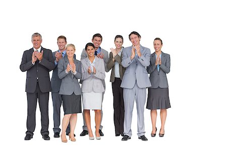 executives applauding - Smiling business team applauding at camera on white background Stock Photo - Budget Royalty-Free & Subscription, Code: 400-08136453