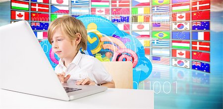 Cute boy using laptop against composite image of cloud computing drawer Stock Photo - Budget Royalty-Free & Subscription, Code: 400-08137191