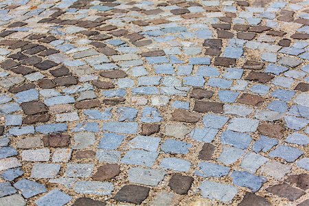 simsearch:400-04932502,k - Stone pavement texture. Granite cobblestoned pavement background. Abstract background of old cobblestone pavement close-up. Photographie de stock - Aubaine LD & Abonnement, Code: 400-08138245