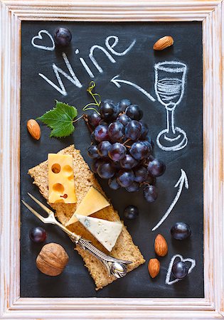 simsearch:400-04040057,k - Grape cheese wine chalk board. Delicious food ingredients for picnic. Stock Photo - Budget Royalty-Free & Subscription, Code: 400-08138368
