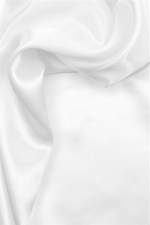 Smooth elegant white silk can use as wedding background Photographie de stock - Aubaine LD & Abonnement, Code: 400-08130449