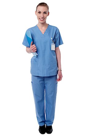 simsearch:400-08131186,k - Smiling female nurse holding clipboard Foto de stock - Royalty-Free Super Valor e Assinatura, Número: 400-08130626