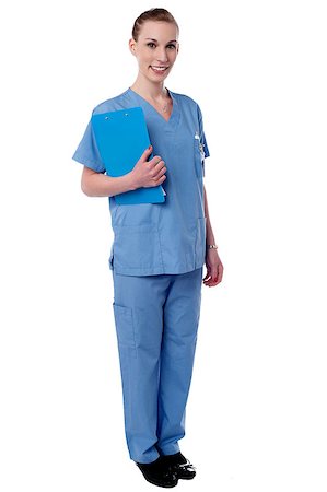 simsearch:400-08131186,k - Smiling female physician holding clipboard Stock Photo - Budget Royalty-Free & Subscription, Code: 400-08130631