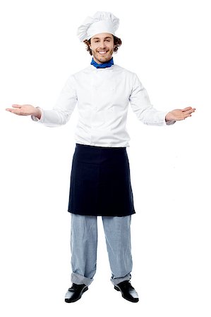 Chef posing with his arms wide open, welcoming guests Stock Photo - Budget Royalty-Free & Subscription, Code: 400-08130666