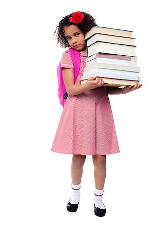 Cute schoolgirl carrying stack of books Stock Photo - Budget Royalty-Free & Subscription, Code: 400-08130844