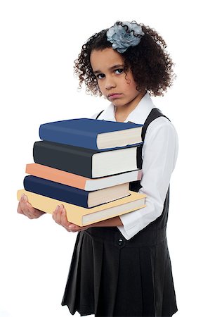 school girl holding pile of books - Sad faced girl holding stack of school books Stock Photo - Budget Royalty-Free & Subscription, Code: 400-08130848