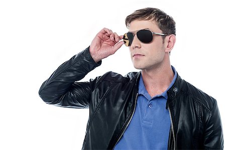 simsearch:400-06477858,k - Casual young man wearing leather jacket and sunglasses Stock Photo - Budget Royalty-Free & Subscription, Code: 400-08130997