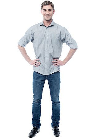 simsearch:400-08110461,k - Handsome smart man posing with hand on hips Foto de stock - Super Valor sin royalties y Suscripción, Código: 400-08131005