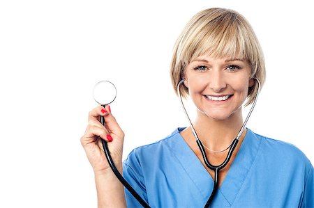 doctor checkup models pictures - Smiling female doctor showing his stethoscope Stock Photo - Budget Royalty-Free & Subscription, Code: 400-08131071