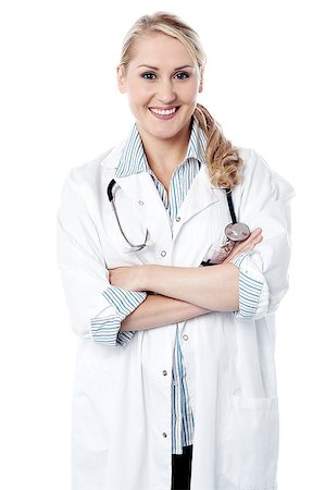 simsearch:400-08131186,k - Smiling female doctor posing with folded arms Foto de stock - Royalty-Free Super Valor e Assinatura, Número: 400-08131164
