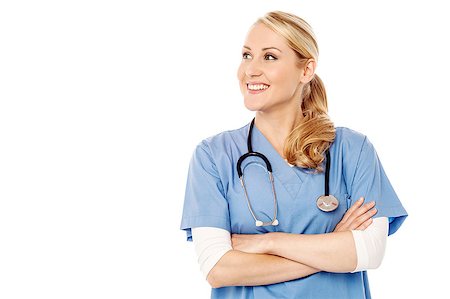 simsearch:400-08131186,k - Beautiful nurse with folded arms, looking away Foto de stock - Royalty-Free Super Valor e Assinatura, Número: 400-08131168