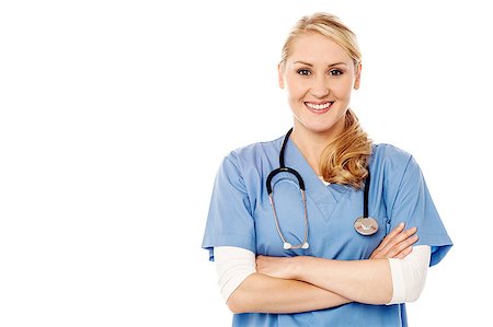 simsearch:400-08131186,k - Beautiful female doctor posing with folded arms Stock Photo - Budget Royalty-Free & Subscription, Code: 400-08131186