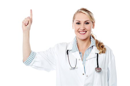 simsearch:400-08131186,k - Attractive female doctor pointing finger upwards Stock Photo - Budget Royalty-Free & Subscription, Code: 400-08131191
