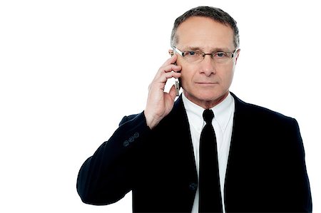 simsearch:400-04596625,k - Mature smart businessman calling by the phone Stock Photo - Budget Royalty-Free & Subscription, Code: 400-08131280