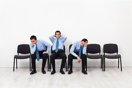 simsearch:400-05240736,k - Desperate businessmen sitting on chairs having doubts about the future Stock Photo - Budget Royalty-Free & Subscription, Code: 400-08131534