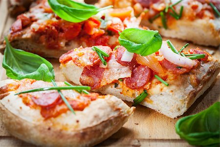 simsearch:400-07465860,k - Pizza bread with herbs and basill Stock Photo - Budget Royalty-Free & Subscription, Code: 400-08131589