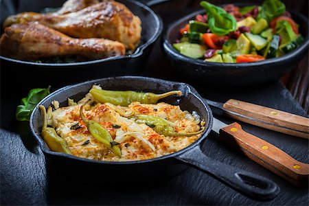 simsearch:400-07260354,k - Baked feta cheese with avocado salad and grilled chicken legs Stockbilder - Microstock & Abonnement, Bildnummer: 400-08131592