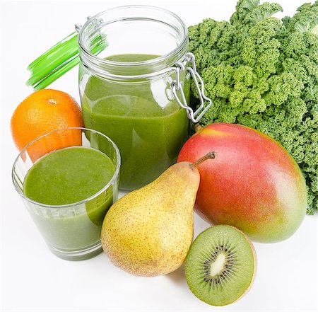 Green smoothie in a glass and in a open jar with fresh kale. A raw, healthy and vegan beverage made of green leafs and fruits. Stock Photo - Budget Royalty-Free & Subscription, Code: 400-08132365