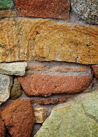 Background of Big Colored Cracked Brick Stones closeup Stock Photo - Budget Royalty-Free & Subscription, Code: 400-08154047