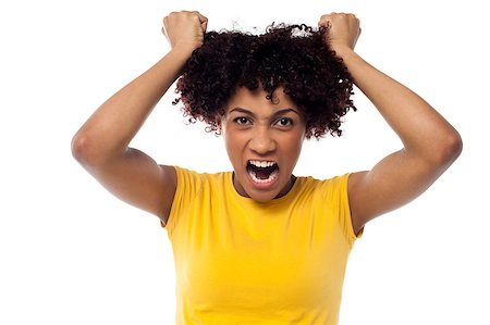 person screaming pulling hair - Irritated woman pulling her hair with both hands, screaming aloud. Stock Photo - Budget Royalty-Free & Subscription, Code: 400-08154185