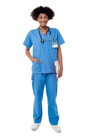 simsearch:400-08131186,k - Young attractive female doctor is standing with the clipboard. Full length over white. Stock Photo - Budget Royalty-Free & Subscription, Code: 400-08154191