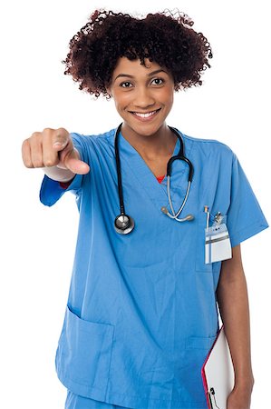 simsearch:400-08131186,k - Charming lady physician pointing her index finger towards you. Foto de stock - Royalty-Free Super Valor e Assinatura, Número: 400-08154193