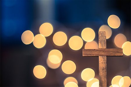simsearch:400-07090264,k - A wooden cross with defocused warm lights in the background. Stock Photo - Budget Royalty-Free & Subscription, Code: 400-08154620