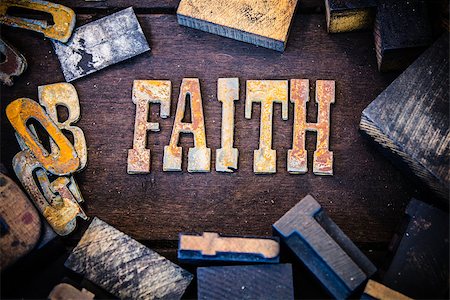 simsearch:400-06087640,k - The word FAITH written in rusted metal letters surrounded by vintage wooden and metal letterpress type. Stock Photo - Budget Royalty-Free & Subscription, Code: 400-08154660