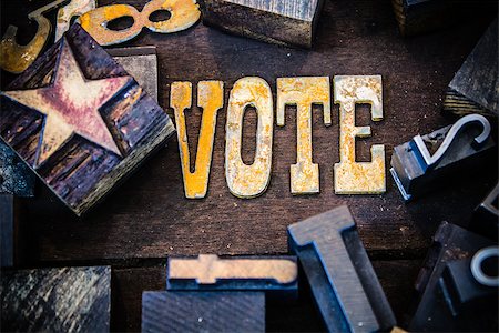 simsearch:400-08154669,k - The word VOTE written in rusted metal letters surrounded by vintage wooden and metal letterpress type. Stock Photo - Budget Royalty-Free & Subscription, Code: 400-08154670