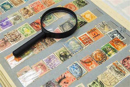 Collection of vintage postage stamps in an album Stock Photo - Budget Royalty-Free & Subscription, Code: 400-08155464