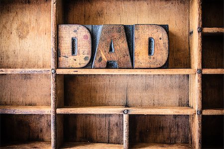 festa del papà - The word DAD written in vintage wooden letterpress type in a wooden type drawer. Fotografie stock - Microstock e Abbonamento, Codice: 400-08156308