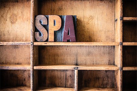 simsearch:400-08152413,k - The word SPA written in vintage wooden letterpress type in a wooden type drawer. Foto de stock - Super Valor sin royalties y Suscripción, Código: 400-08156310