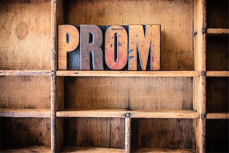 The word PROM written in vintage wooden letterpress type in a wooden type drawer. Stock Photo - Budget Royalty-Free & Subscription, Code: 400-08156327