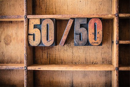 simsearch:400-08161062,k - The word 50/50 written in vintage wooden letterpress type in a wooden type drawer. Stock Photo - Budget Royalty-Free & Subscription, Code: 400-08156353
